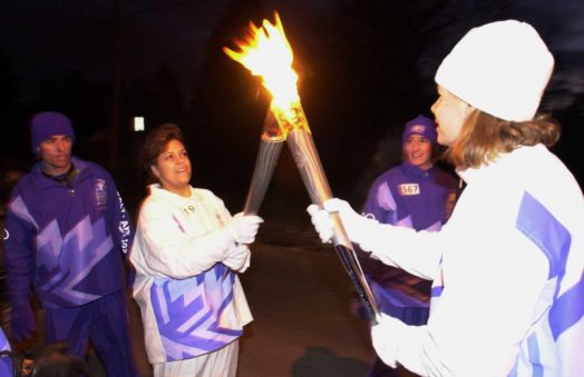 Mariana Lebron carrying the 2002 Olympic torch