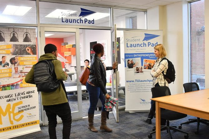 Students enter the Student Launch Pad in Cook Library