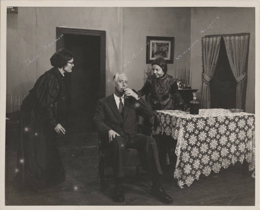 Will he drink the elderberry wine? The Brewster sisters certainly hope so! (My apologies, this is a favorite play, so I get a little excited about it.) From l-r: Thelma Sherman, English professor; Dr. Hawkins; Genevieve Heagney, Principal of the Campus Elementary School.