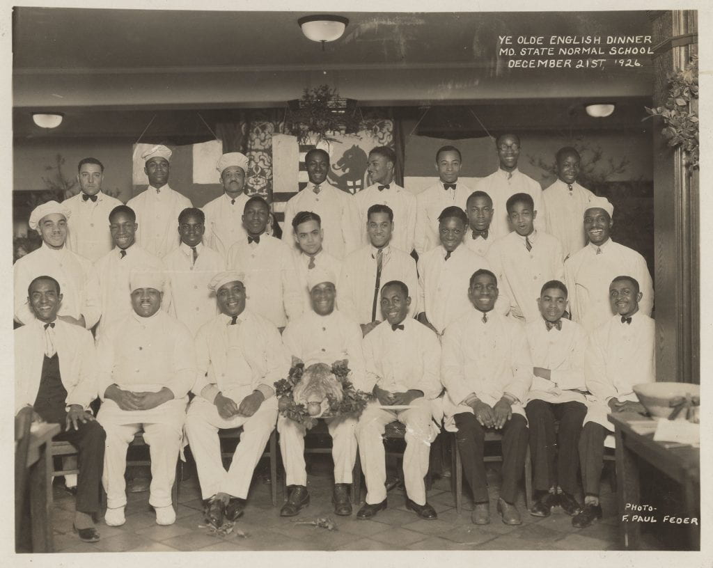 These are the servers and kitchen staff who worked during the Old English Christmas Dinner of 1926. Sadly, we don't know the names of most of these gentlemen.