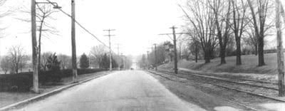 Looking north on York Road in front of campus. The streetcar line runs on the right side.