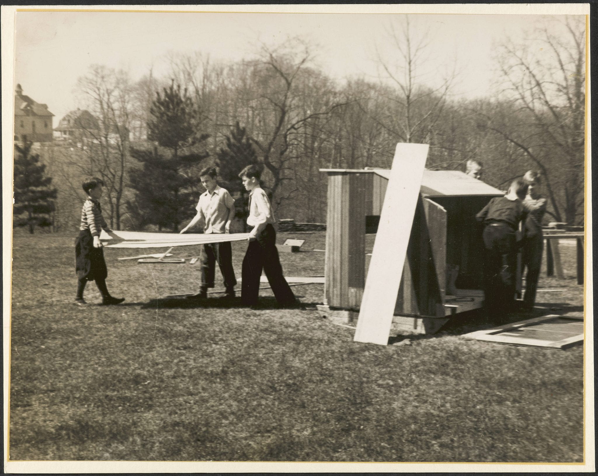 1930s students building a chicken coop.