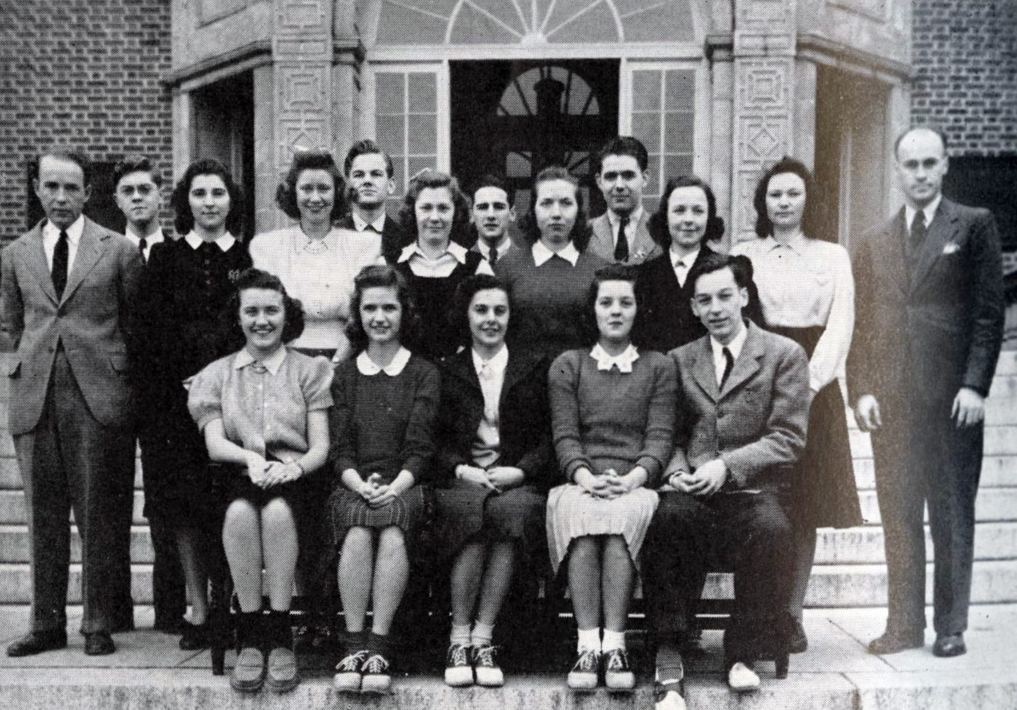 Photograph of 1941 Student Council members and faculty seated and standing on steps of Stephens Hall.