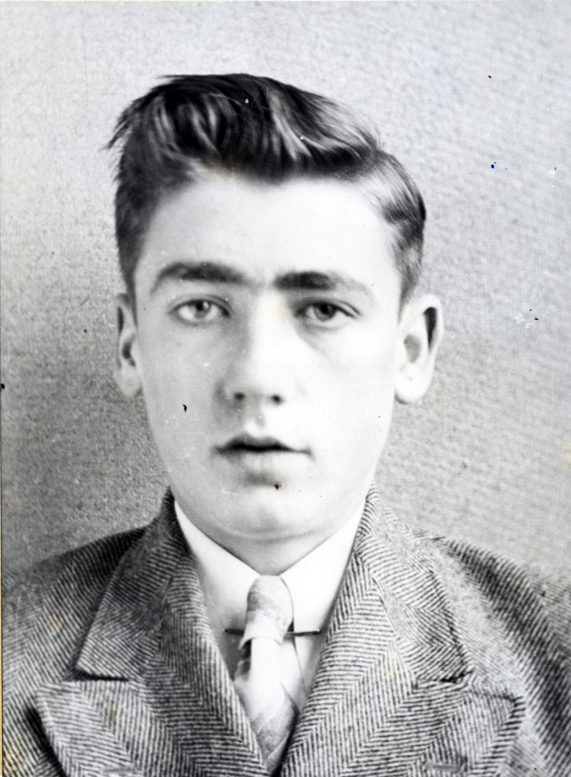 Photo of Robert Lytle dressed in a suit and tie.